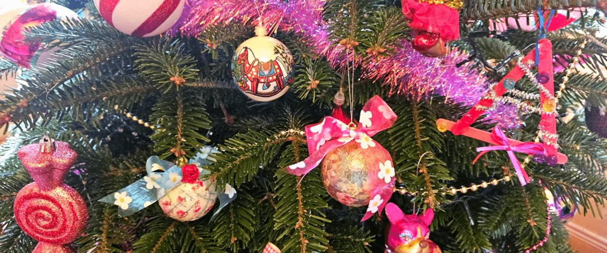 pink, red, white and silver decorations on a Christmas tree